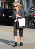 th_28935_celebrity-paradise.com-The_Elder-Ashley_Tisdale_2010-01-29_-__leaves_Byron_and_Tracey_Salon_258_122_116lo.jpg