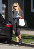 th_28926_celebrity-paradise.com-The_Elder-Ashley_Tisdale_2010-01-29_-__leaves_Byron_and_Tracey_Salon_122_124lo.jpg