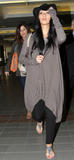 th_71550_celebrity_paradise.com_TheElder_NicoleScherzinger2011_03_14_atLAX4_122_22lo.jpg