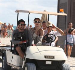 http://img147.imagevenue.com/loc421/th_312774941_Mischa_Barton_Bikini_Candids_on_the_Beach_in_Miami_December_27_2011_246_122_421lo.jpg