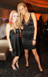 th_31943_Celebutopia-Avril_Lavigne_and_Petra_Nemcova_together-Grand_opening_of_KOI_Las_Vegas-05_122_714lo.jpg