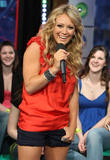 Musician Hilary Duff shows her great legs at MTV's Total Request Live at the MTV Times Square Studios in New York City