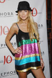 Lindsay Lohan leggy and busty in colorful small dress at Sephora Celebrates Its 10 Year Anniversary in New York City