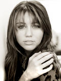 http://img147.imagevenue.com/loc572/th_31868_MileyCyrus20_123_572lo.jpg